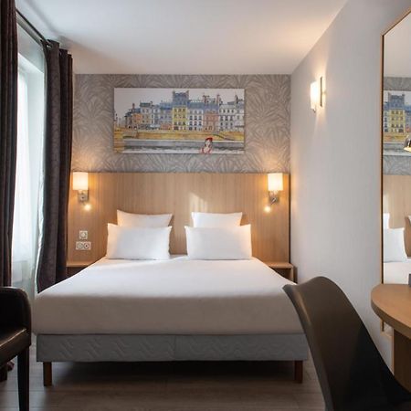 แอล เควซท์ โฮเต็ล Hotel ปารีส ภายนอก รูปภาพ