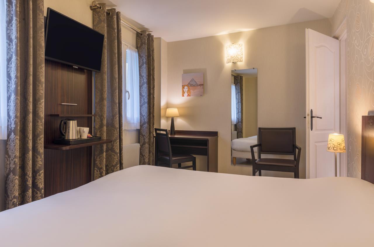 แอล เควซท์ โฮเต็ล Hotel ปารีส ภายนอก รูปภาพ