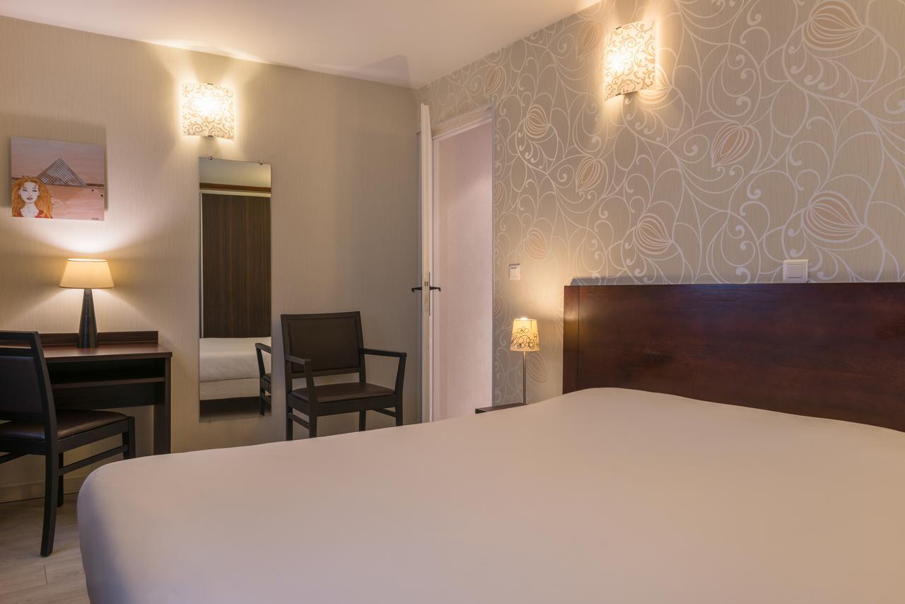 แอล เควซท์ โฮเต็ล Hotel ปารีส ภายนอก รูปภาพ