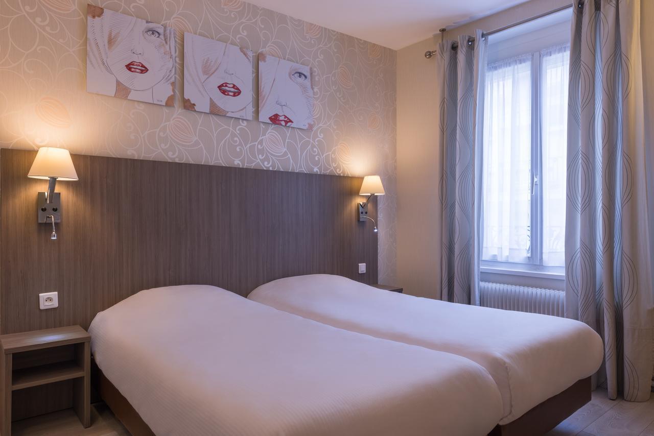 แอล เควซท์ โฮเต็ล Hotel ปารีส ภายนอก รูปภาพ