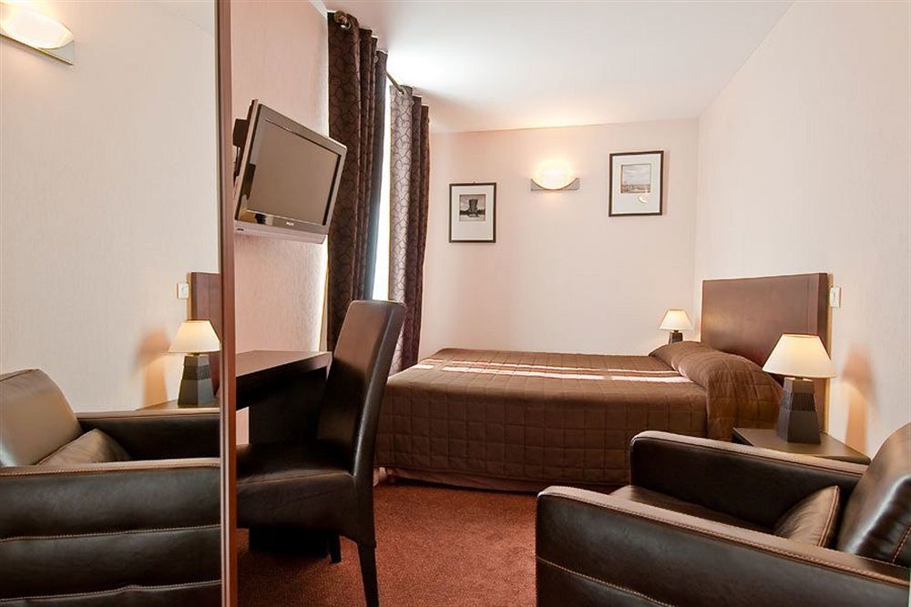 แอล เควซท์ โฮเต็ล Hotel ปารีส ภายนอก รูปภาพ
